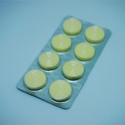 YELLOW CANDIES IN BLISTER PACK