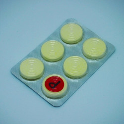 YELLOW CANDIES IN BLISTER PACK
