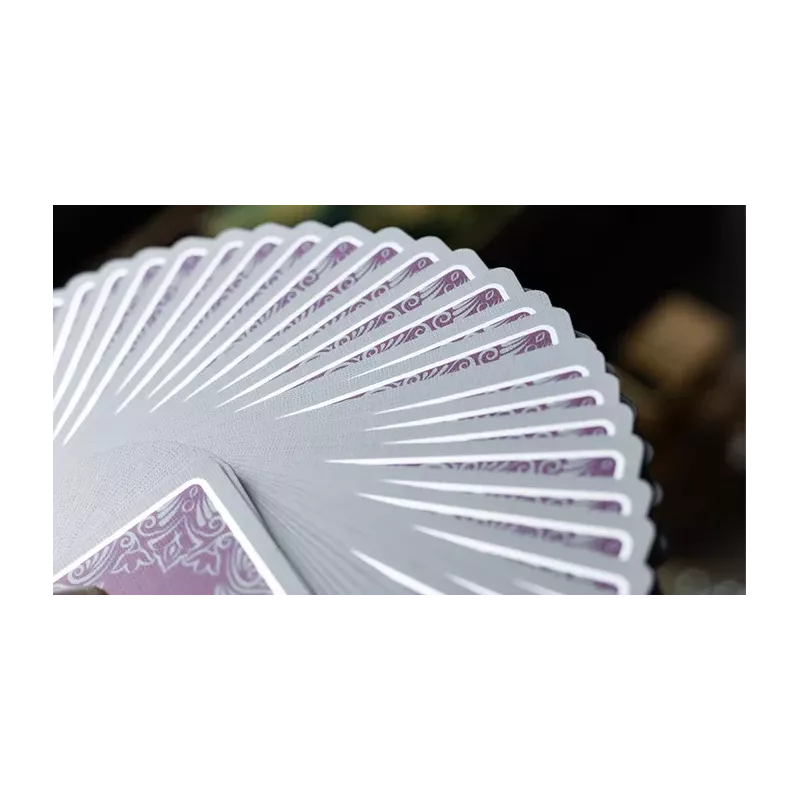 Dos de cartes marqué avec bordure blanche et feuille métallique élégante.